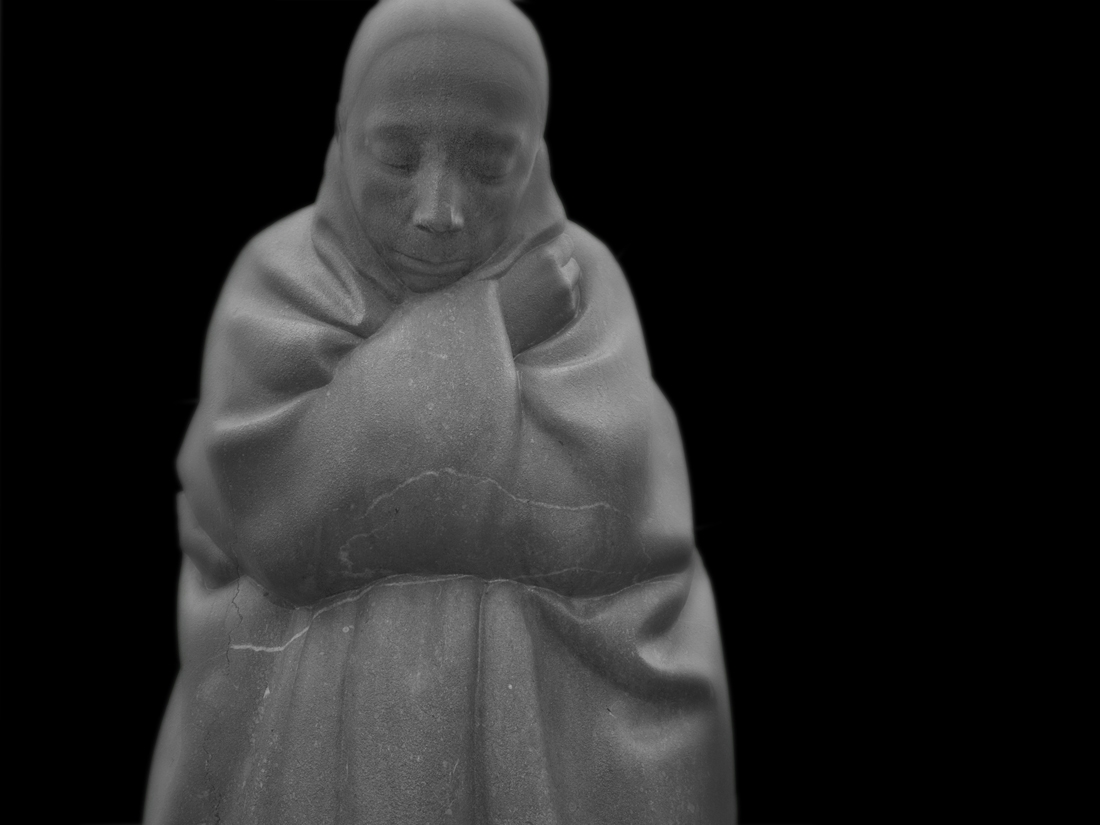 THE GRIEVING PARENTS   of Käthe Kollwitz 